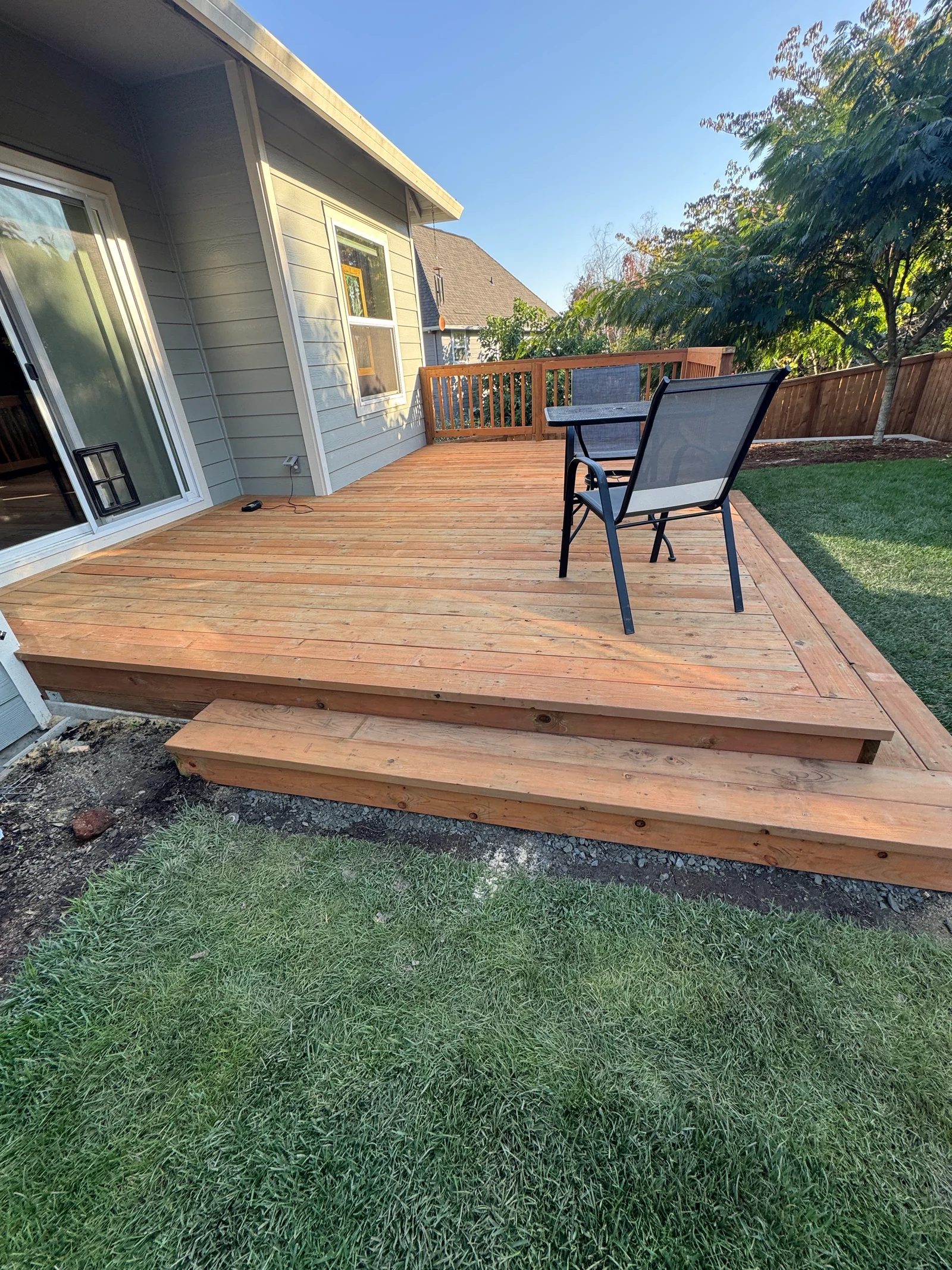 Custom built wood deck attached to a residential home in McMinnville, OR