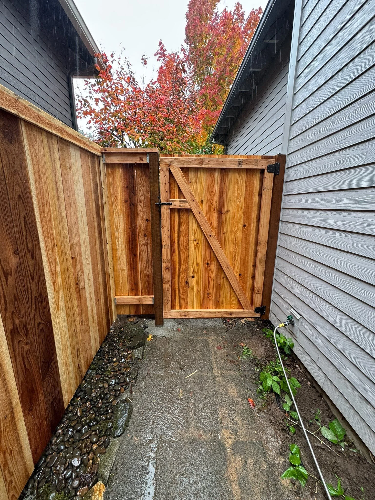 Newly installed wood fence along a residential property in McMinnville, OR